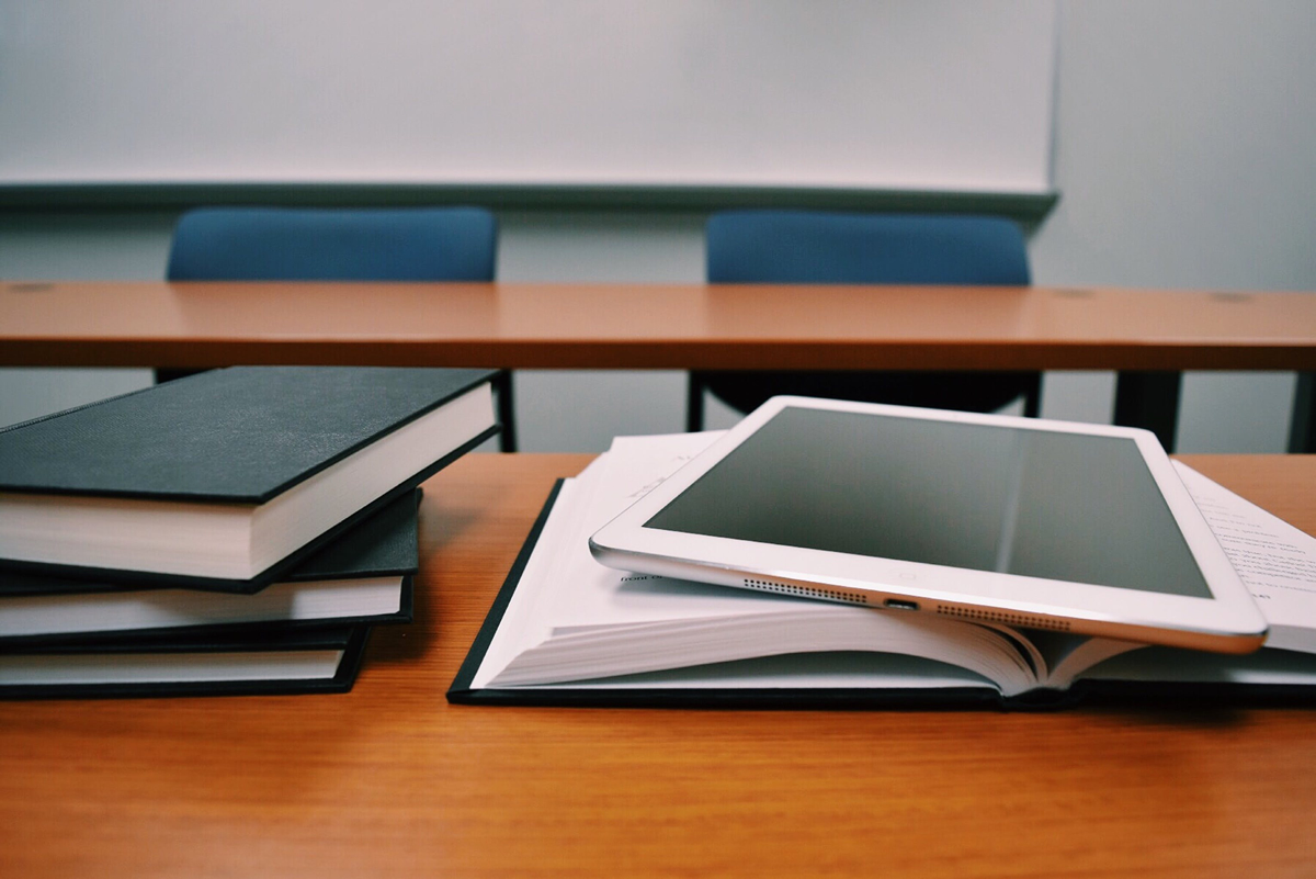 Desk with books on.